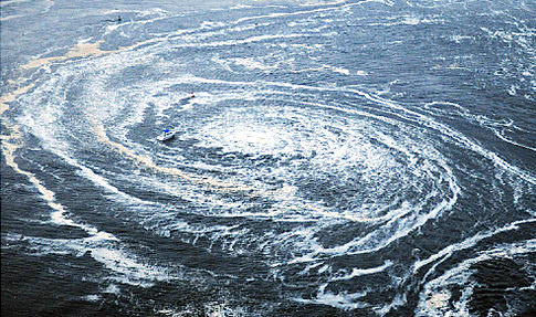 aassets.nydailynews.com_img_2011_03_12_alg_japan_tsunami_whirlpool.jpg