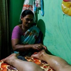 Foot massage. 
Hampi, Karnataka