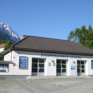 008 The station of the cogwheeltrain in Grainau with the Zugspitze in the b