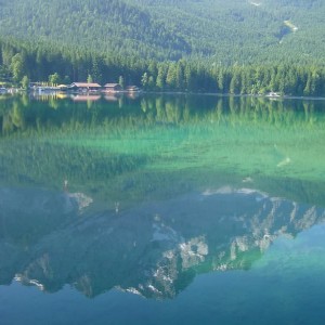 008 A reflection of the Zugspitzsummit in the crystal clear water of lake E