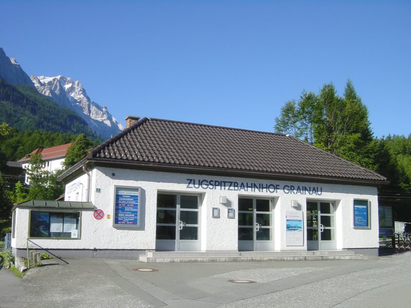 008 The station of the cogwheeltrain in Grainau with the Zugspitze in the b